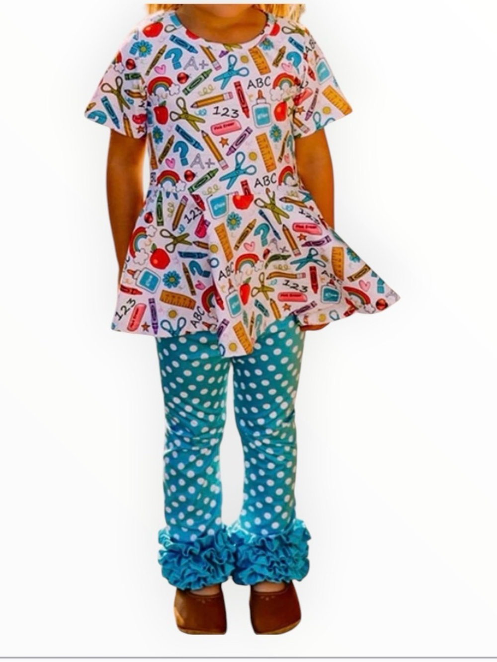 Peplum school themed top and aqua polka dot icing leggings